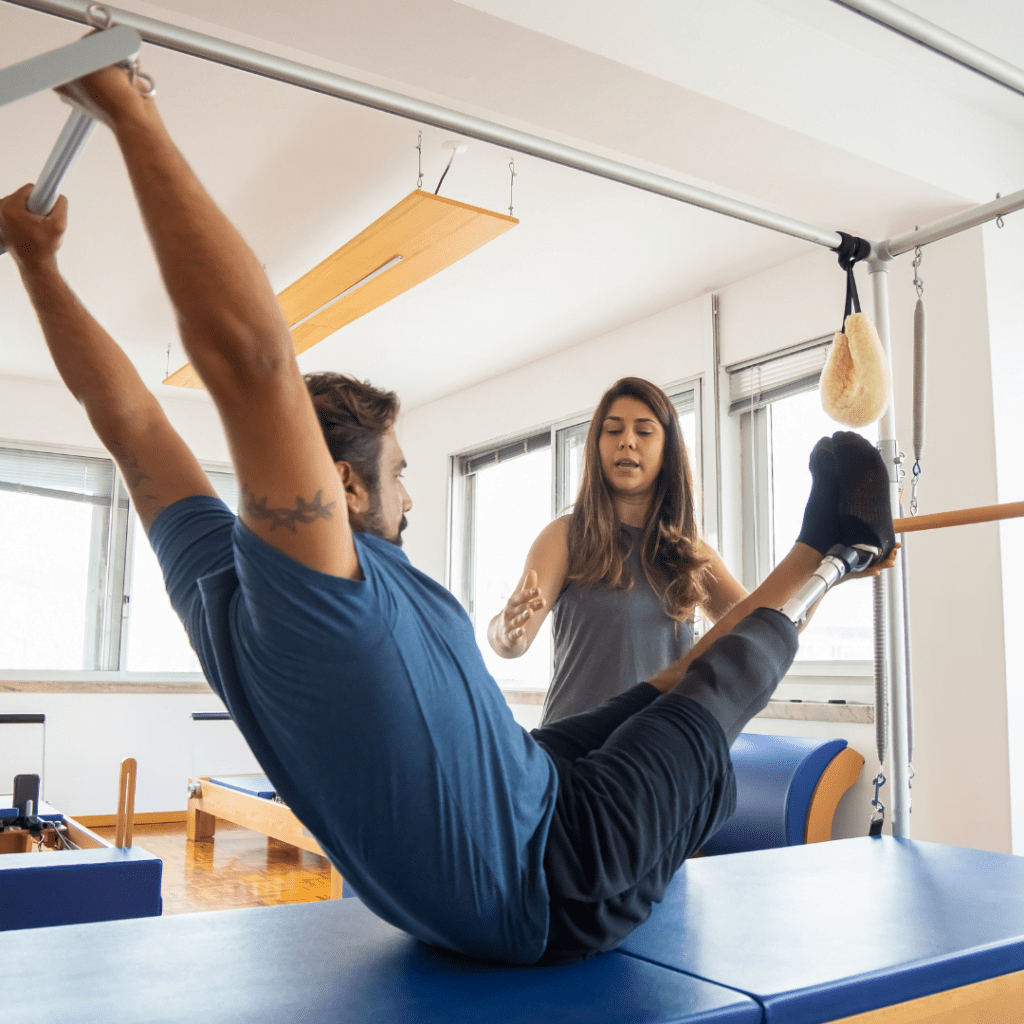 "Image of a professional physical therapist assisting a patient with rehabilitation exercises in a well-equipped clinic, with a map highlighting various Select Physical Therapy locations across the United States."