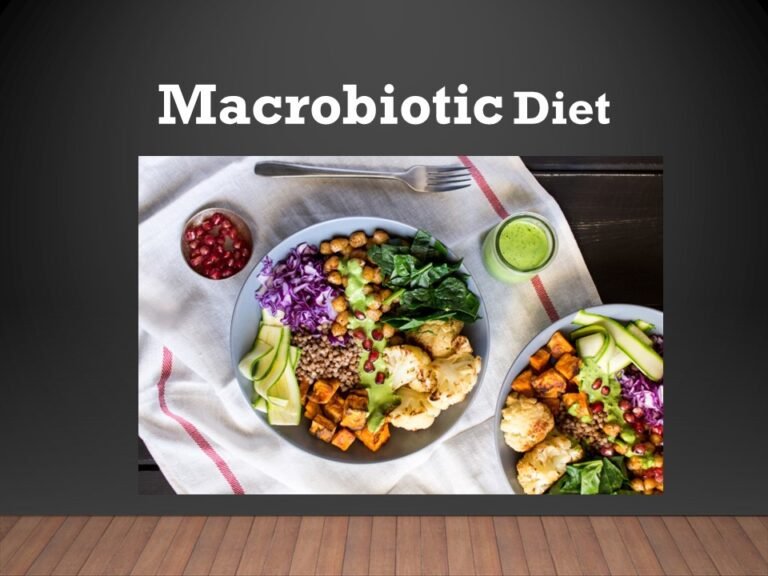 "A balanced macrobiotic diet featuring brown rice, colorful steamed vegetables like carrots, broccoli, and kale, along with chickpeas and seaweed garnish on a rustic table."